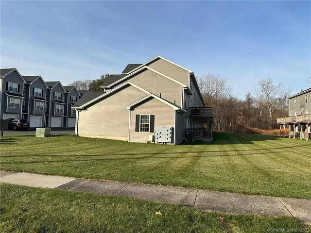 a bathroom with a toilet and a bathtub