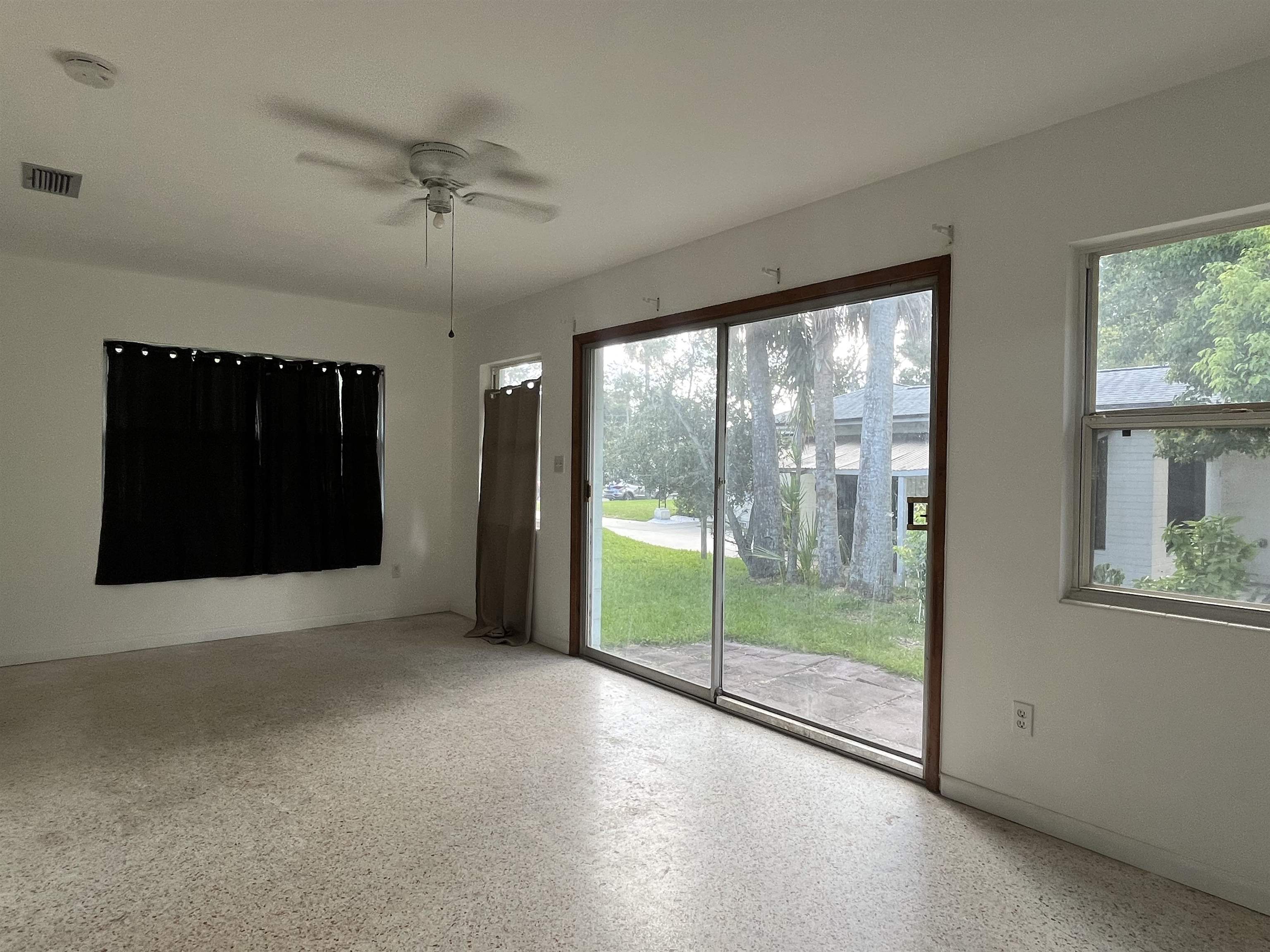 58 Riberia Street St. Augustine, FL 32084 - Photo 17 of 20 a view of an empty room with a window