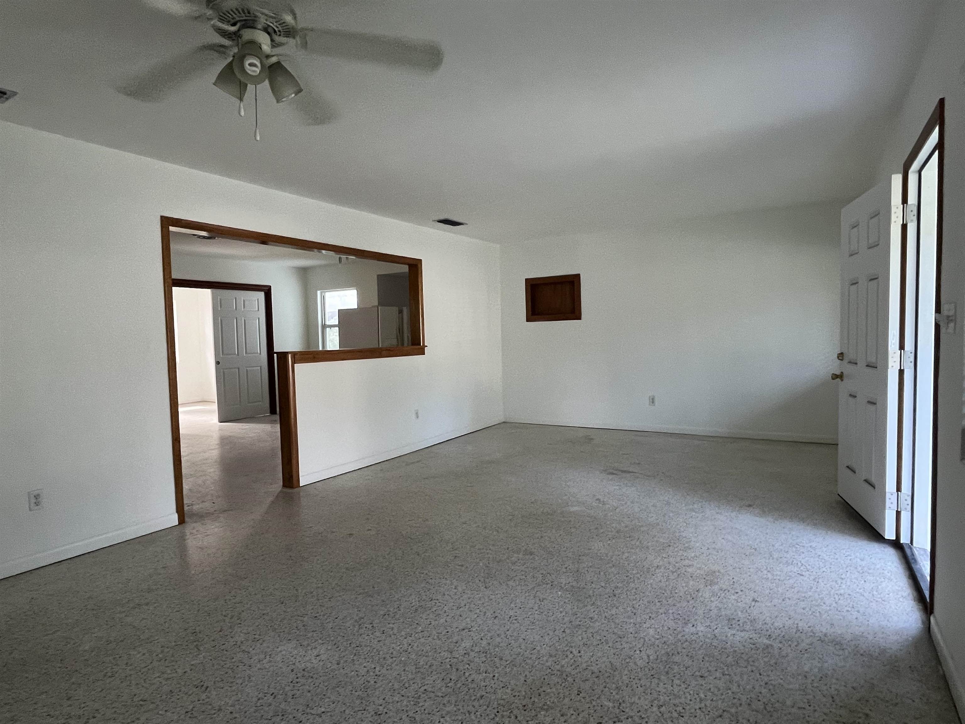 58 Riberia Street St. Augustine, FL 32084 - Photo 18 of 20 an empty room with a empty space and windows