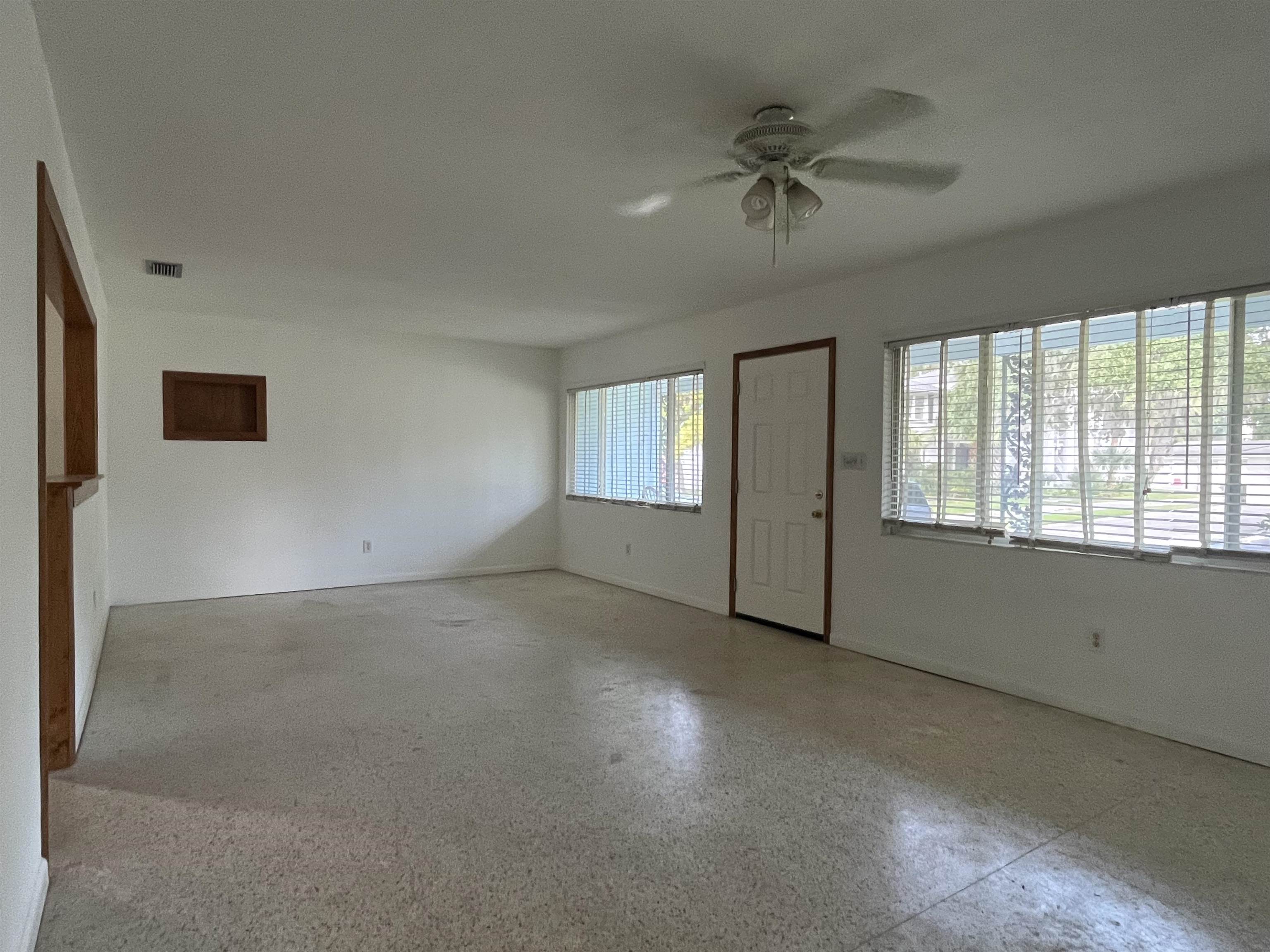 58 Riberia Street St. Augustine, FL 32084 - Photo 5 of 20 a view of an empty room with a window