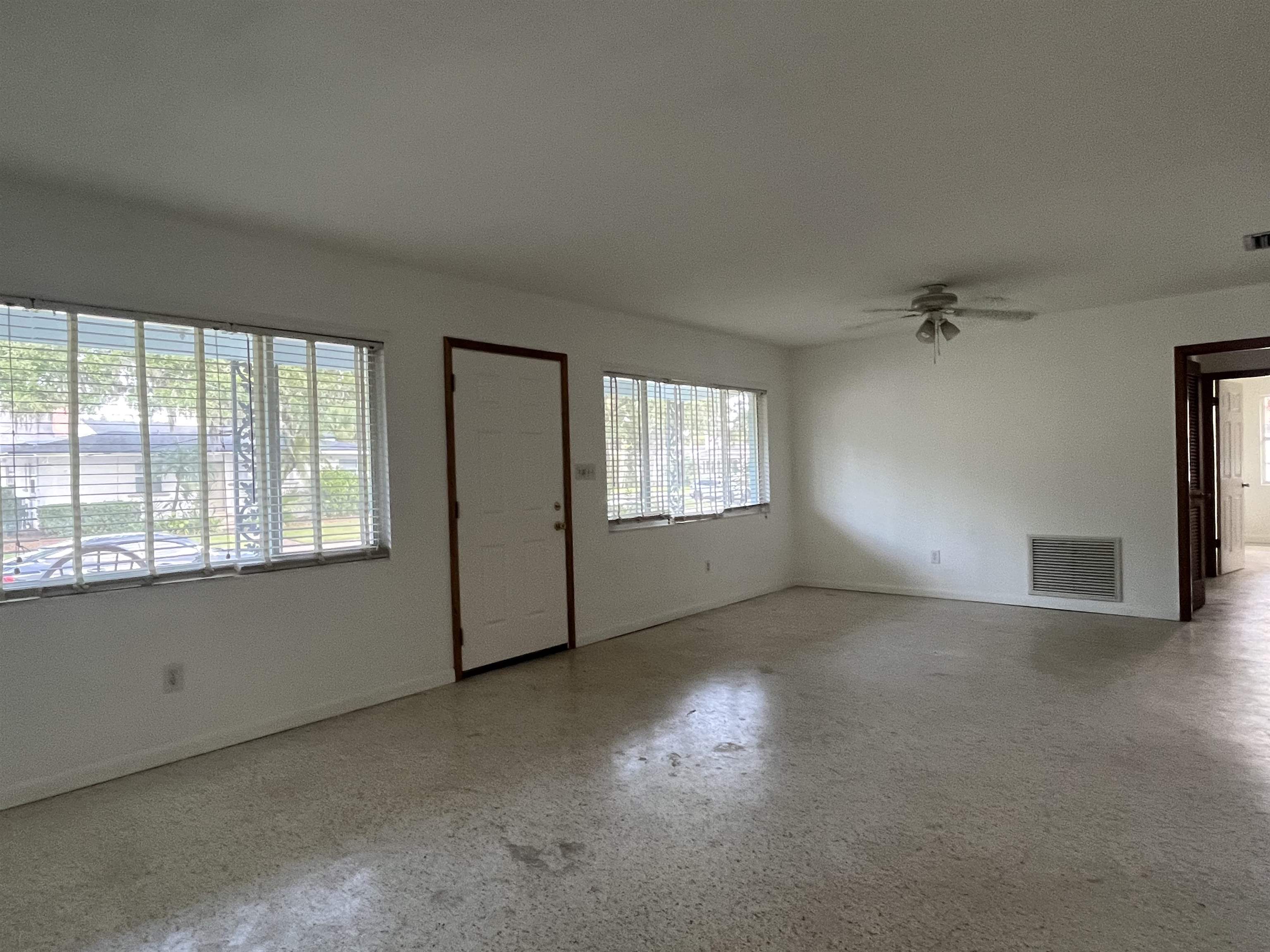 58 Riberia Street St. Augustine, FL 32084 - Photo 6 of 20 a view of an empty room with a window