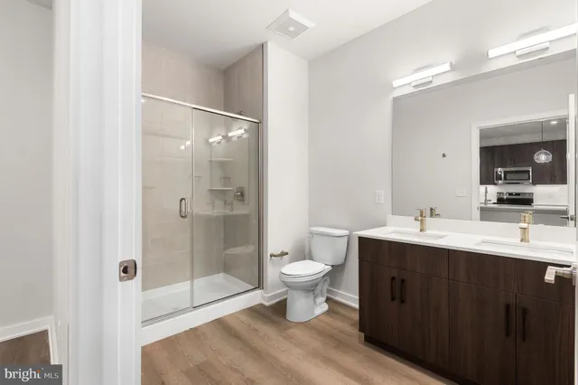 an empty room with wooden floor