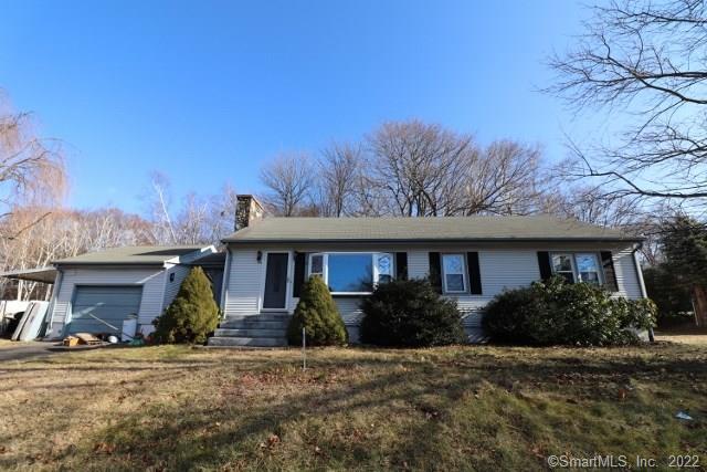 54 Mattatuck Road Bristol, CT 06010 - Photo 1 of 1 a front view of a house with garden