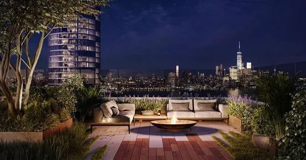 a view of swimming pool and lounge chairs