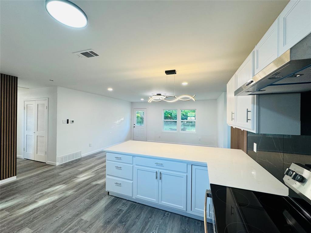 106 Hillcrest Street Mansfield, TX 76063 - Photo 14 of 26 a spacious bathroom with a double vanity sink and a mirror