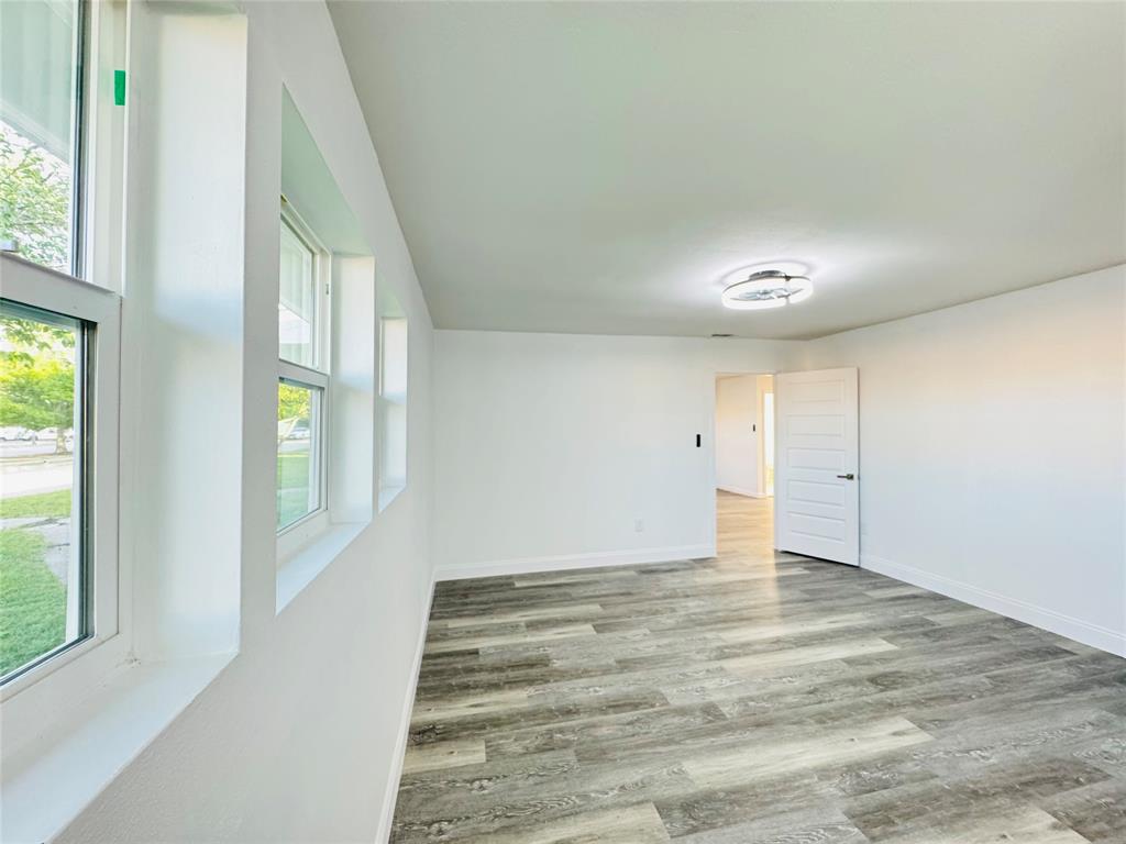 106 Hillcrest Street Mansfield, TX 76063 - Photo 21 of 26 a view of an empty room with a window