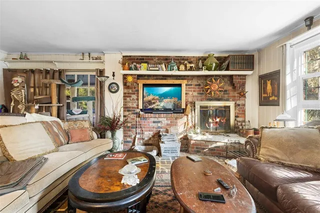 a bed room with a bed and a wooden floor