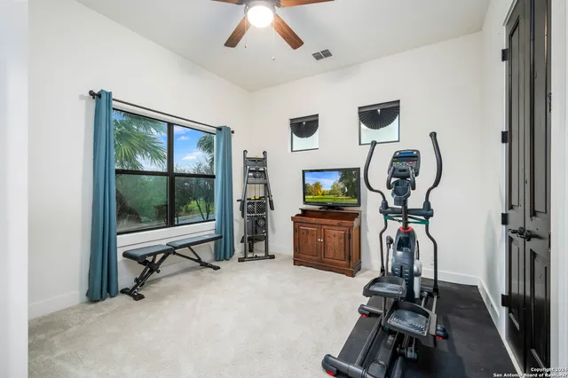 a view of a room with gym equipment