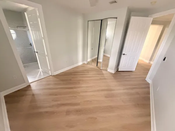 a view of an empty room and window