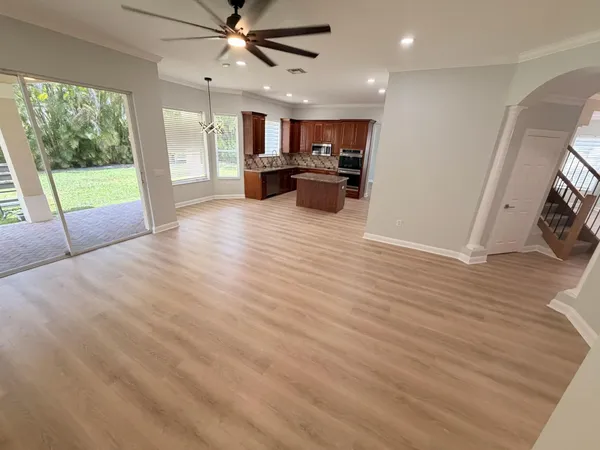 a view of a kitchen with a sink and a window