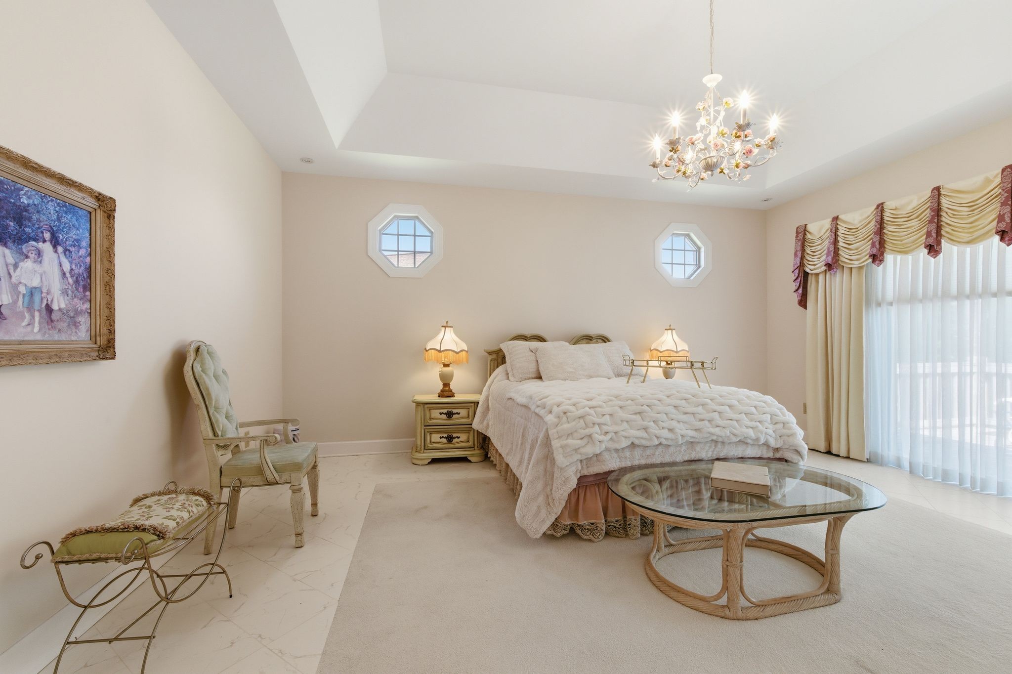528 Country Club Drive Dickson, TN 37055 - Photo 36 of 55 a bedroom with a bed and a chandelier