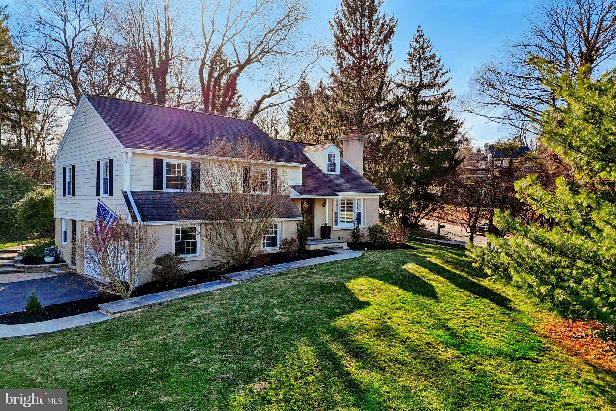 Charming home nestled among lush greenery.