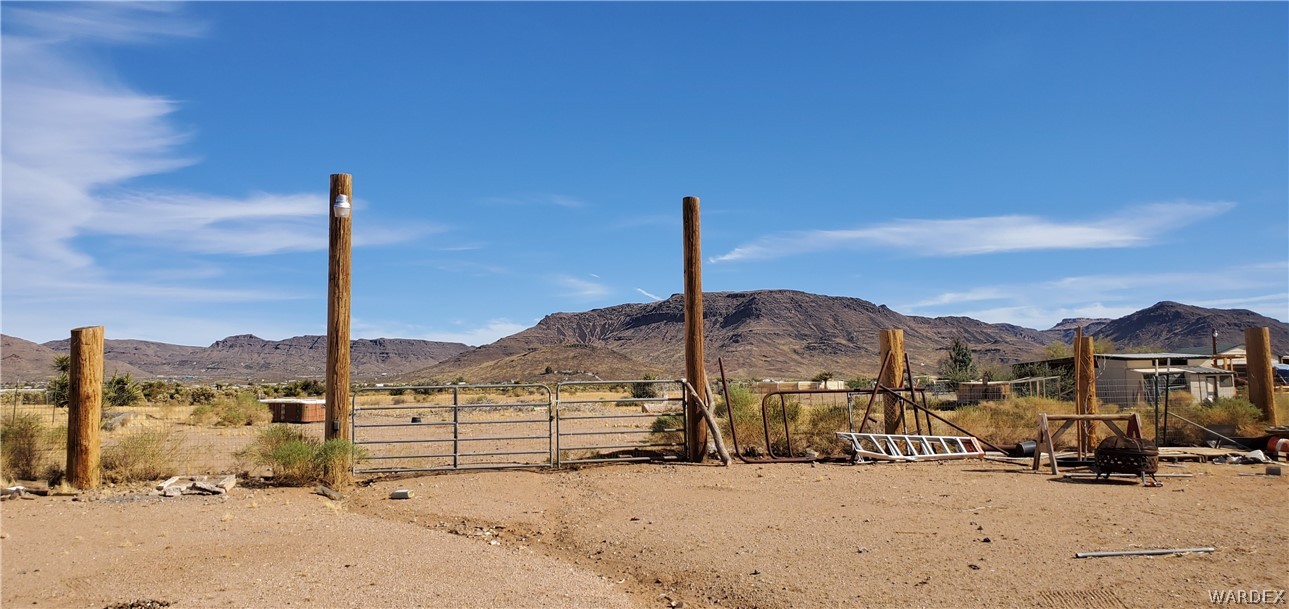 564 Bacobi Road Golden Valley, AZ 86413 - Photo 28 of 50 a view of a road with a building in the background