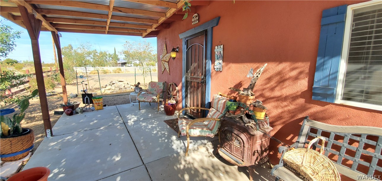 564 Bacobi Road Golden Valley, AZ 86413 - Photo 3 of 50 a room with balcony stairs and furniture