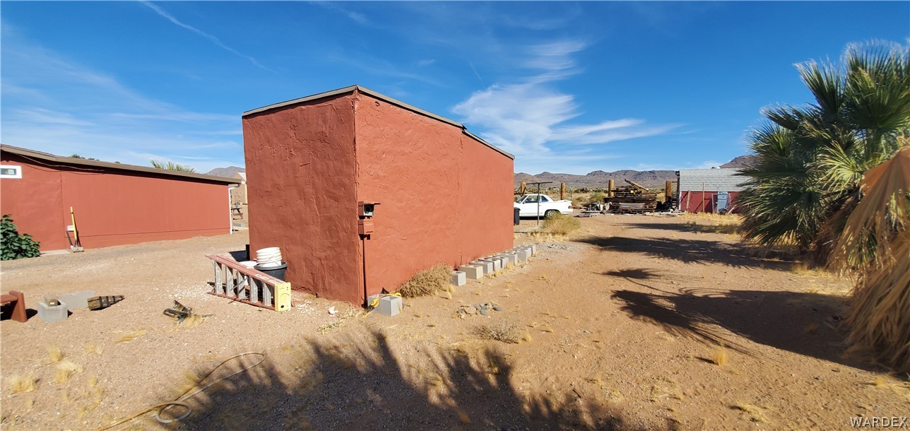 564 Bacobi Road Golden Valley, AZ 86413 - Photo 34 of 50 a view of a backyard of a house