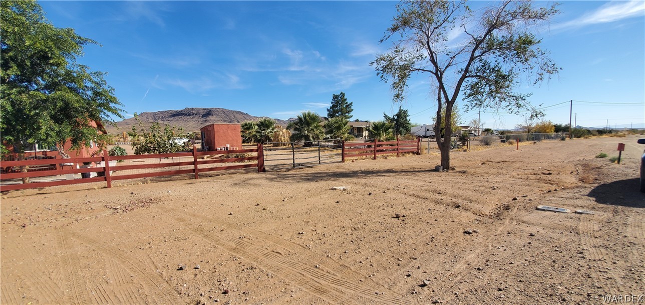 564 Bacobi Road Golden Valley, AZ 86413 - Photo 50 of 50 a view of the road with a tree
