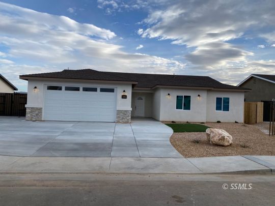 1046 Ocean Avenue Ridgecrest, CA 93555 - Photo 1 of 19 a view of a house with a patio