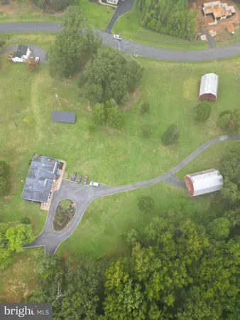 a front view of a house with parking space