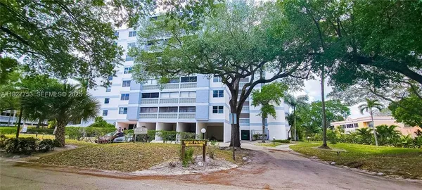 a front view of a building with street view