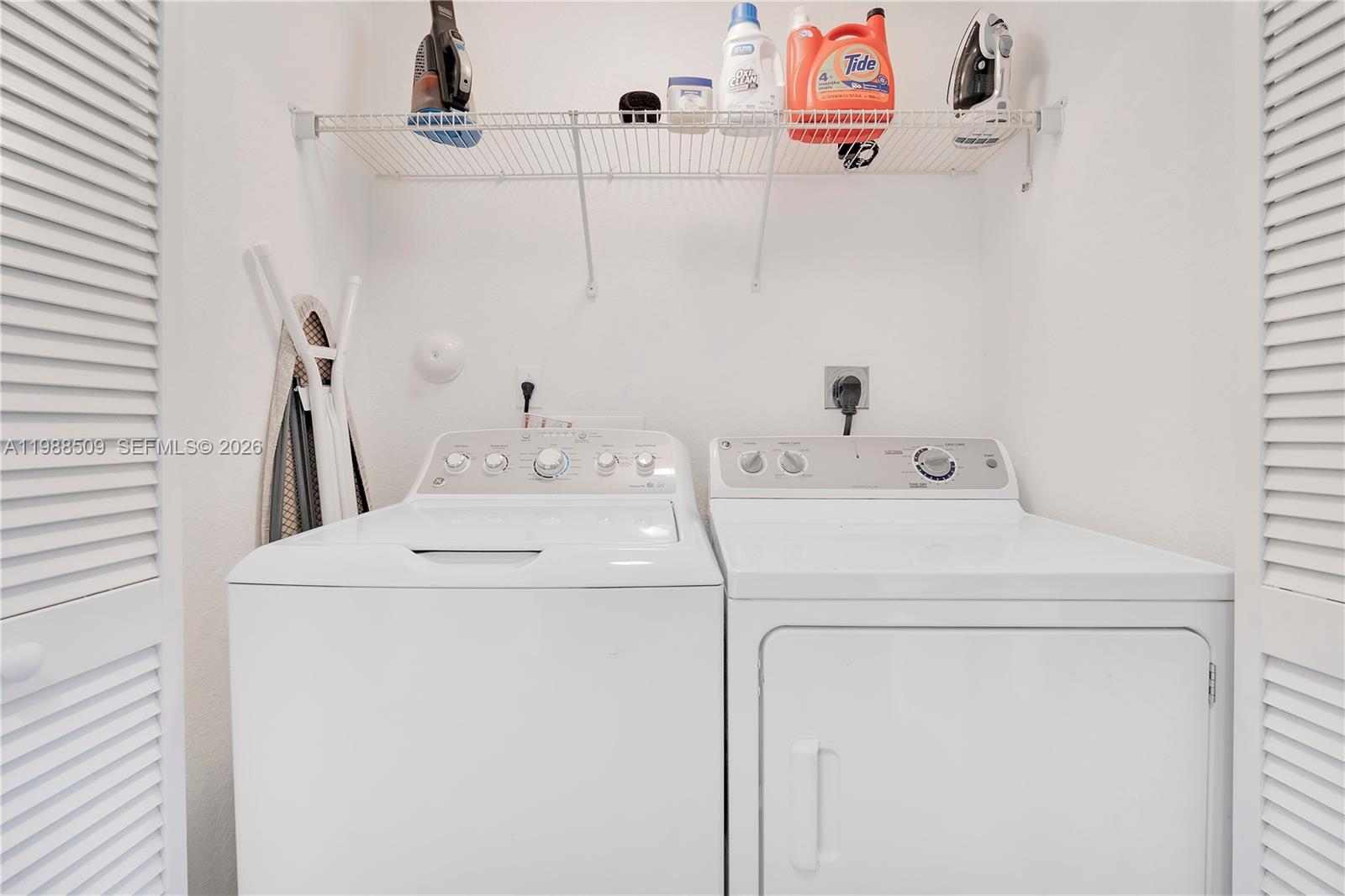 23484 Southwest 112th Court Homestead, FL 33032 - Photo 19 of 33 a utility room with dryer and washer