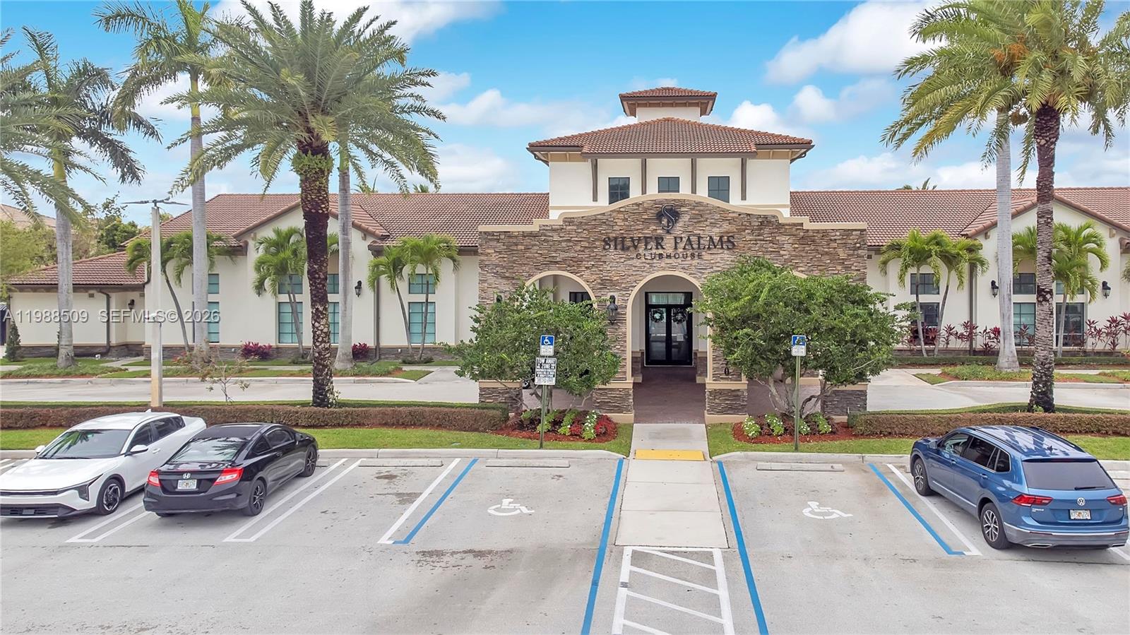 23484 Southwest 112th Court Homestead, FL 33032 - Photo 24 of 33 a front view of a house with swimming pool and sitting area
