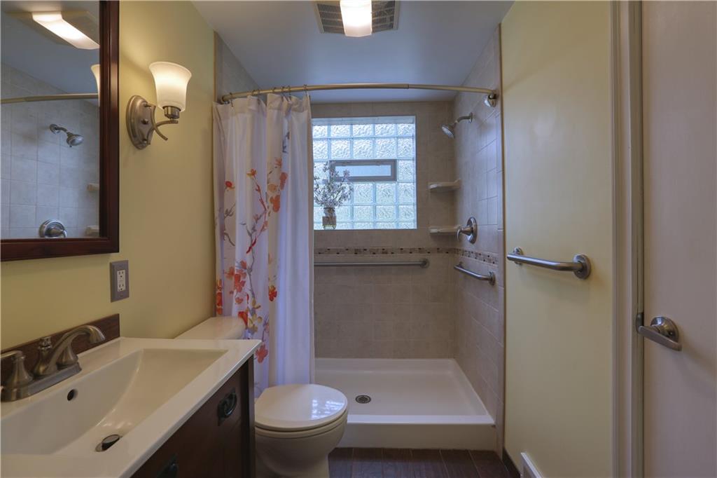 267 Blackhawk Road Beaver Falls, PA 15010 - Photo 11 of 25 The main bath was updated in 2016 and includes a walk-in shower.