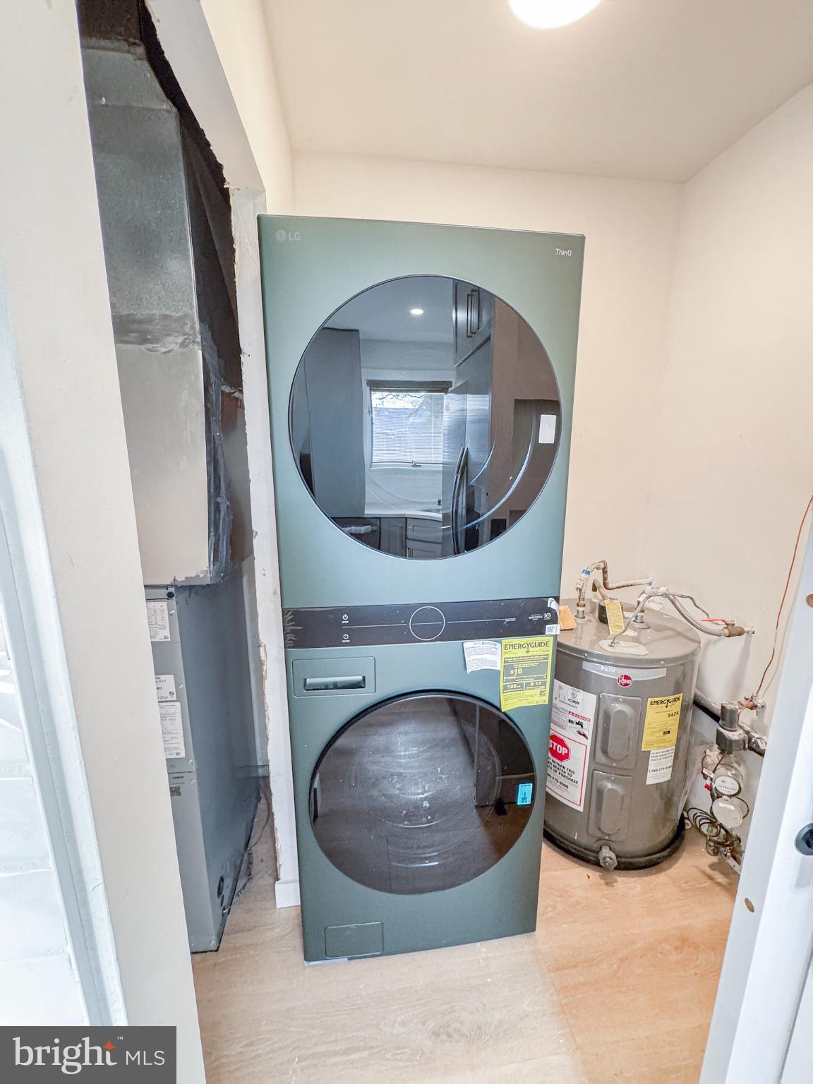 604 Cobblestone Road Williamstown, NJ 08094 - Photo 9 of 15 Modern laundry setup in a compact space.