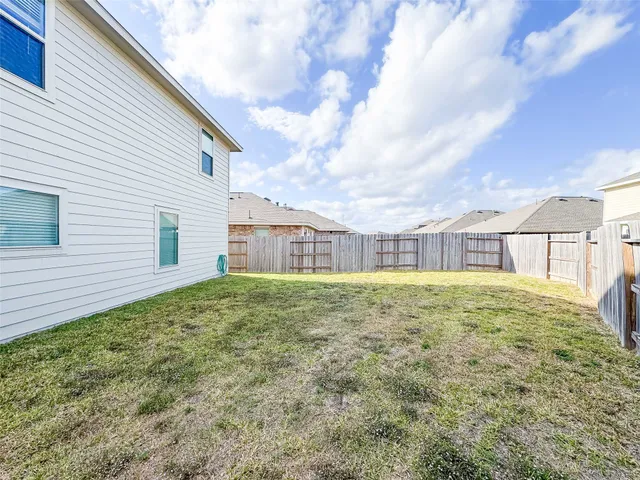 a view of a backyard with a garden