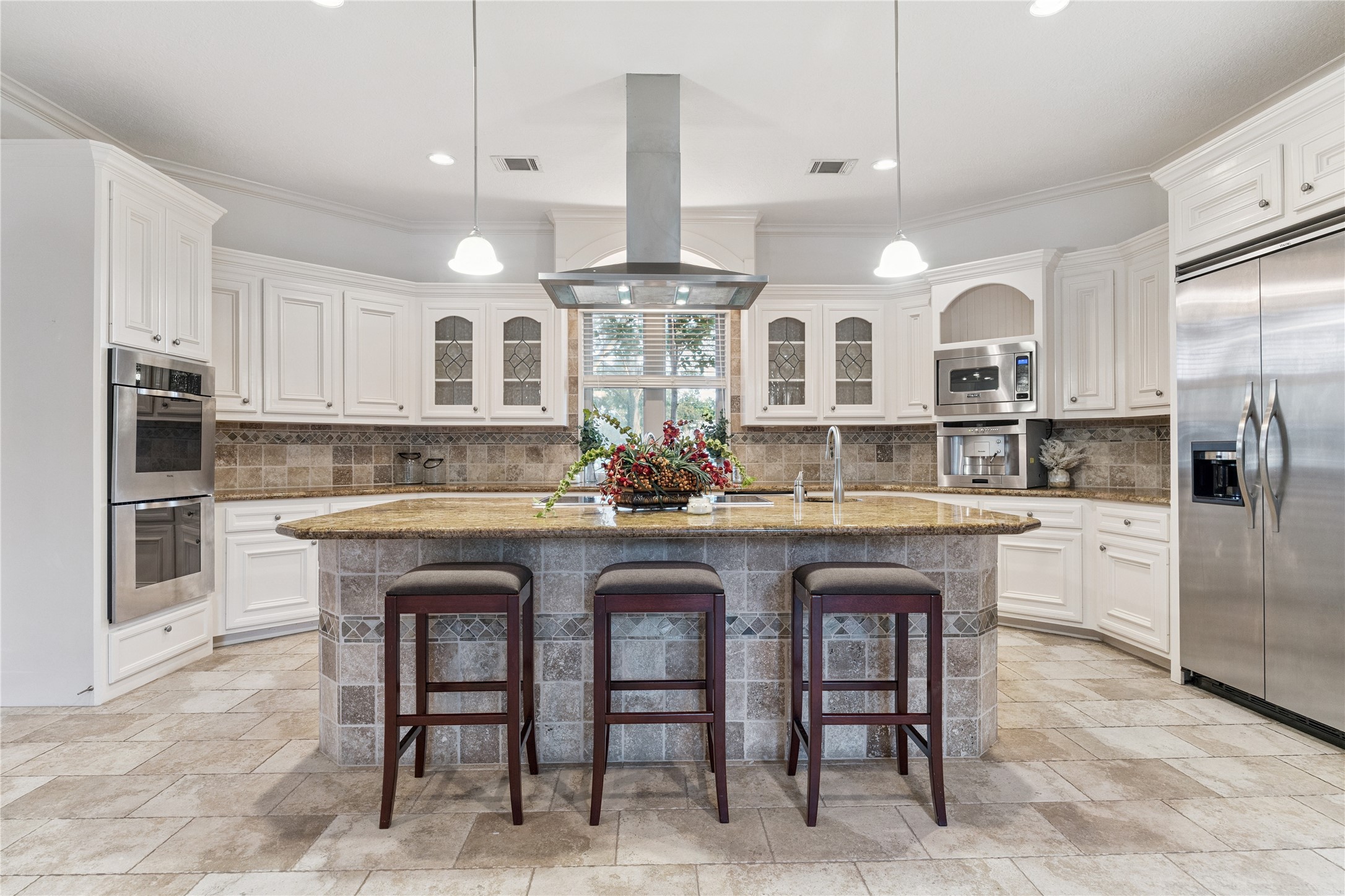 16218 Barklea Road Cypress, TX 77429 - Photo 12 of 36 a kitchen with granite countertop a center island a sink cabinets and stainless steel appliances