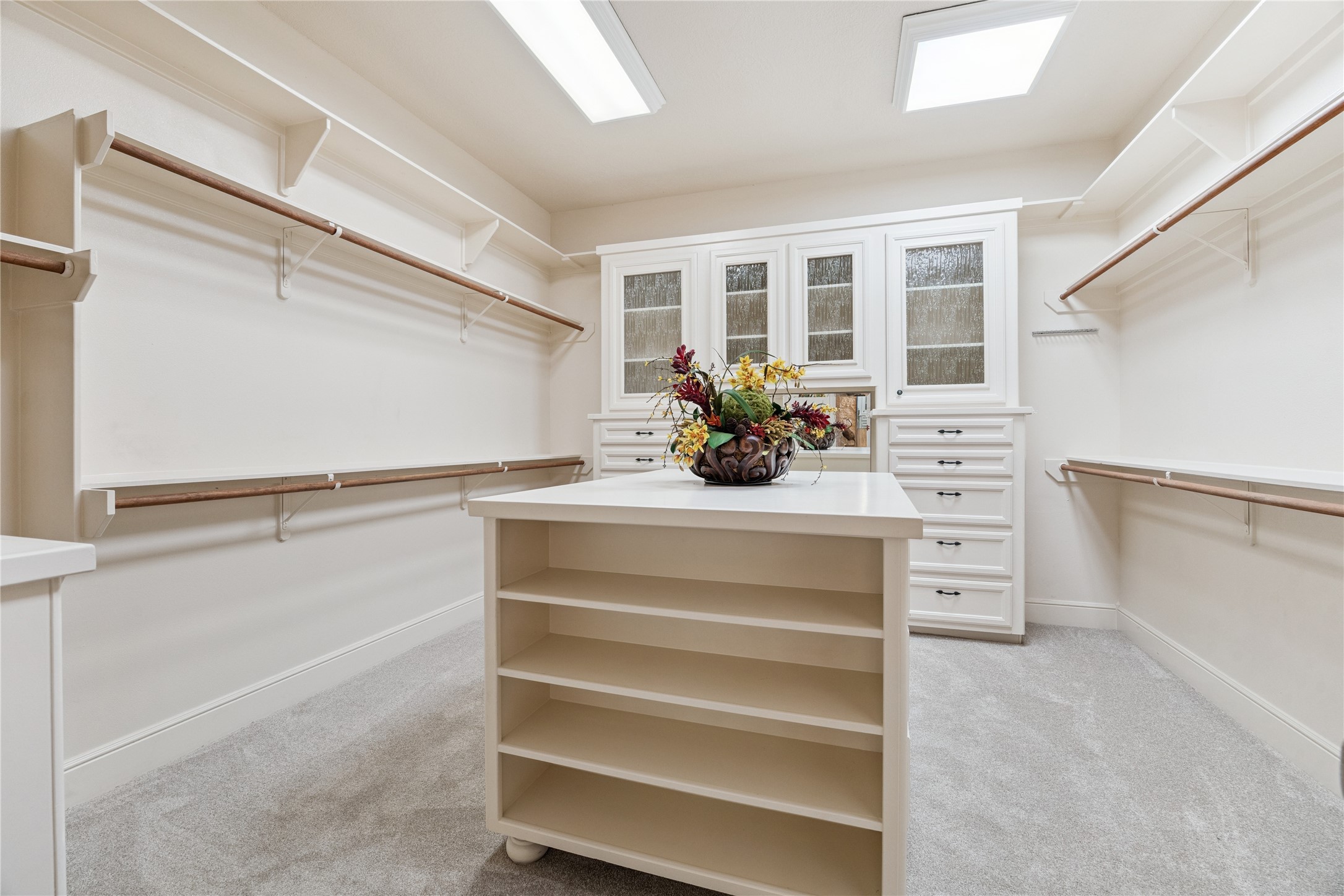 16218 Barklea Road Cypress, TX 77429 - Photo 23 of 36 a view of walk in closet with empty racks