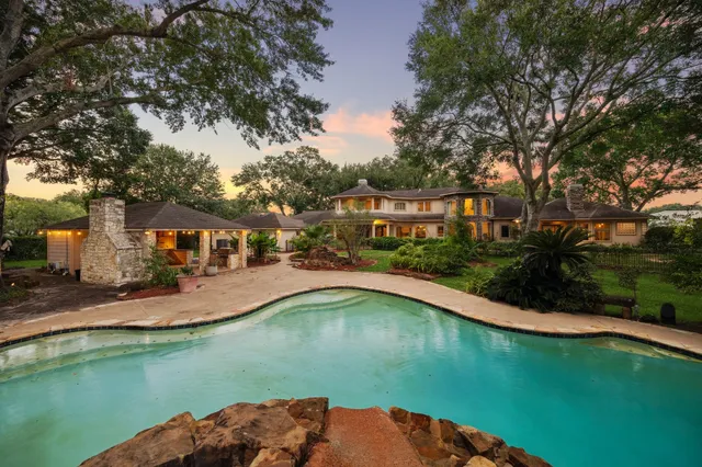 a view of a lake with a house