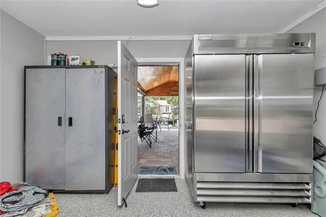 a view of a house with outdoor space and a patio