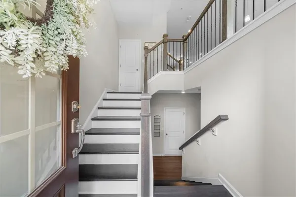 a view of entryway with wooden floor