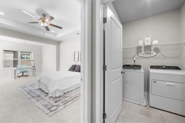 a living room with a bed and furniture