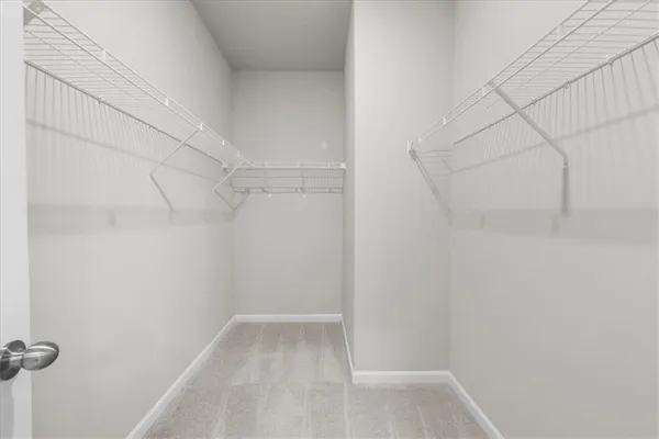 a view of a room with racks on the wall