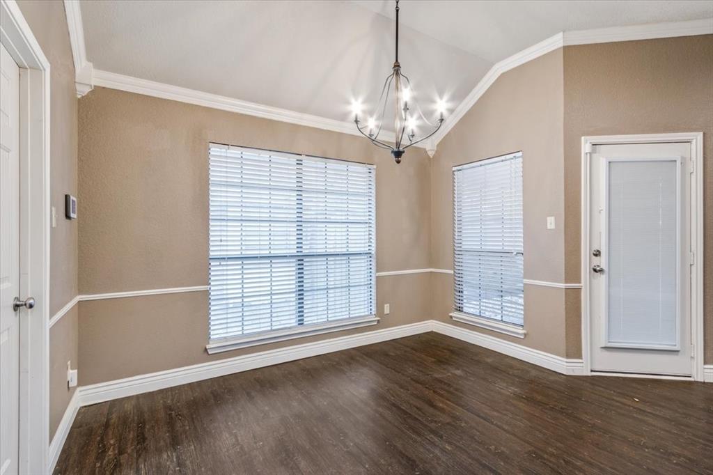 9508 Riviera Drive Waco, TX 76712 - Photo 10 of 24 wooden floor in an empty room with a window