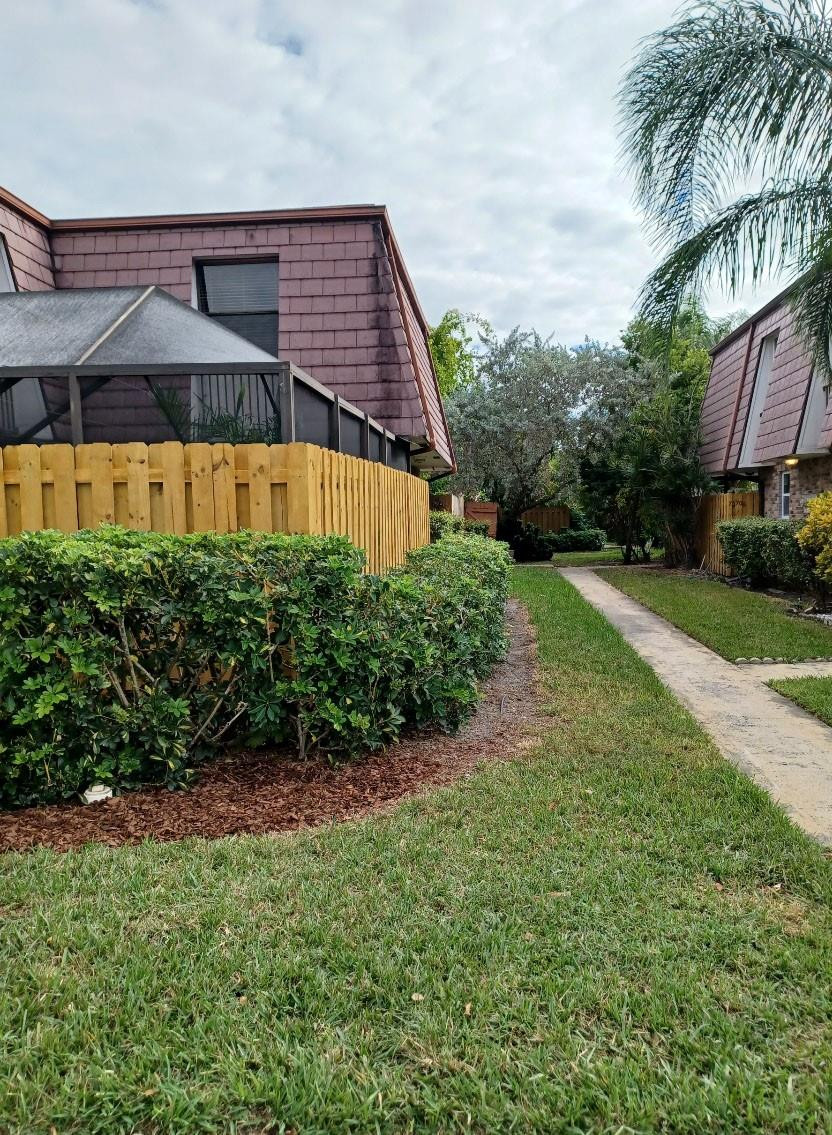 7586 Courtyard Run East Boca Raton, FL 33433 - Photo 26 of 26 New wood fencing around courtyard