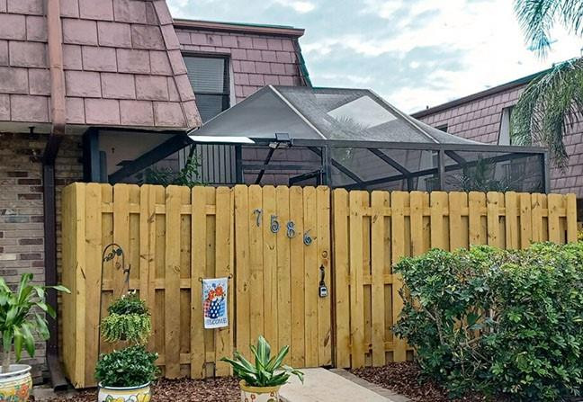 7586 Courtyard Run East Boca Raton, FL 33433 - Photo 3 of 26 Entry Gate