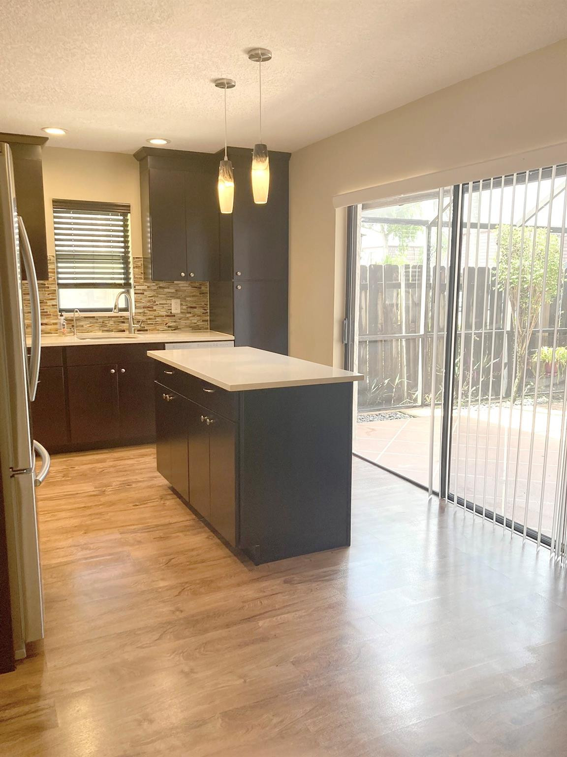 7586 Courtyard Run East Boca Raton, FL 33433 - Photo 5 of 26 Kitchen/Dining area, lots of storage