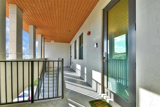 a view of staircase with lots of trees in the background