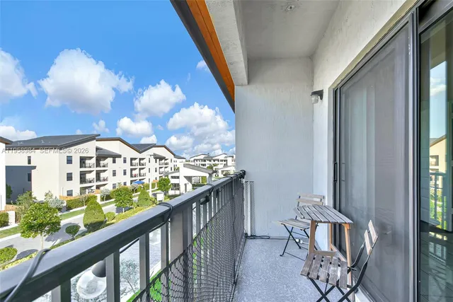 a view of a balcony with an outdoor space