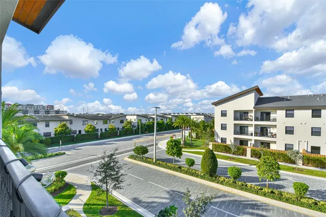 a view of a patio with swimming pool