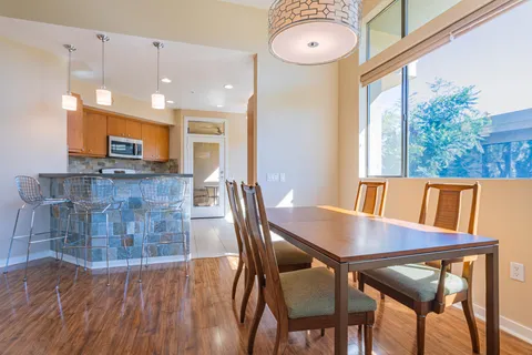 a bathroom with a sink a mirror and a shower