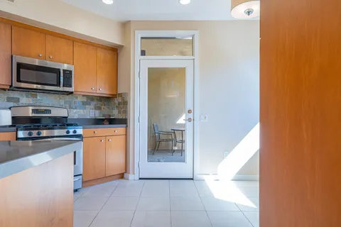 a view of chair and table in a room
