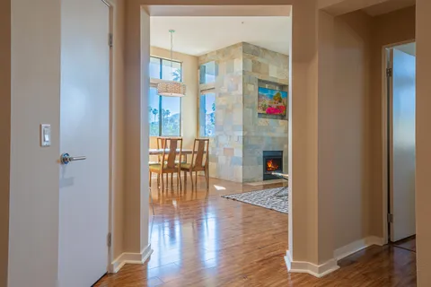 a living room with furniture and a rug