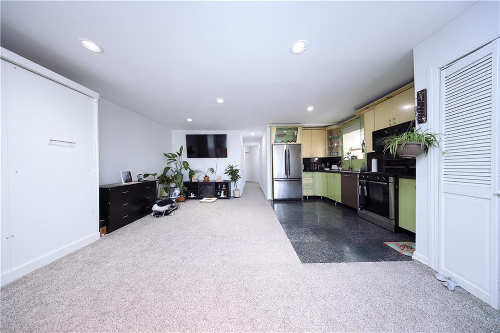 468 Ave Y Brooklyn, NY 11223 - Photo 17 of 47 a view of a living room kitchen and a window