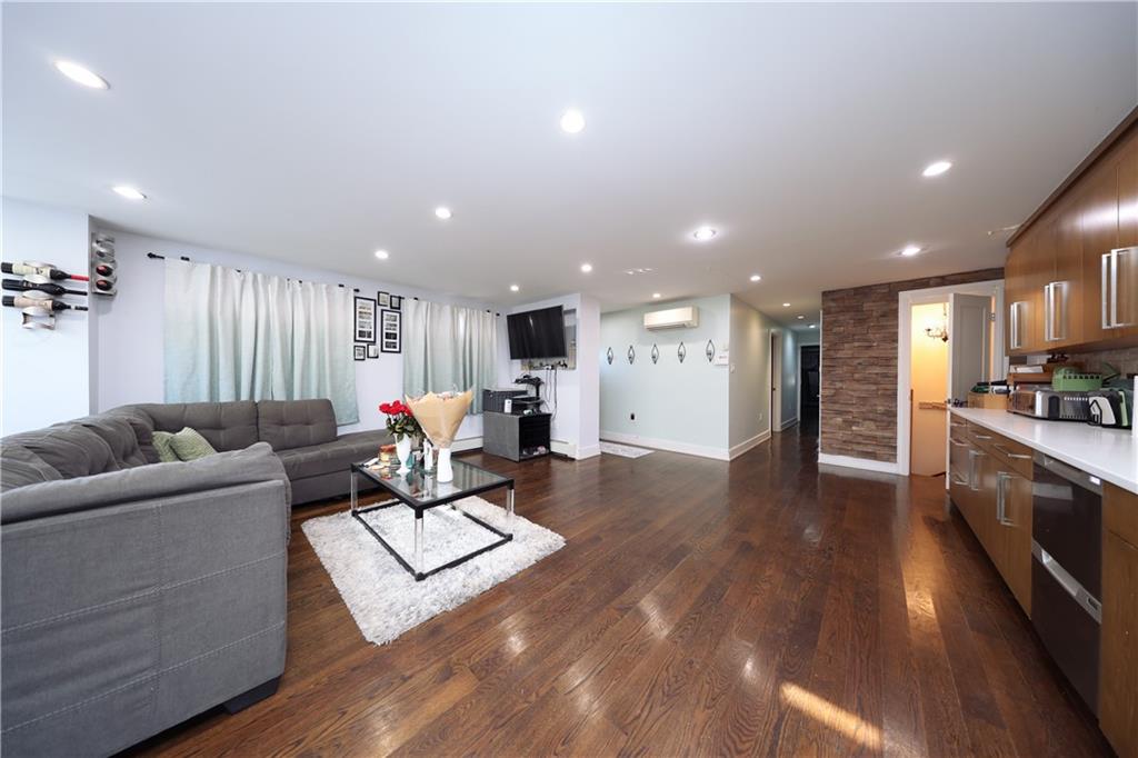 468 Ave Y Brooklyn, NY 11223 - Photo 26 of 47 a living room with furniture and kitchen view