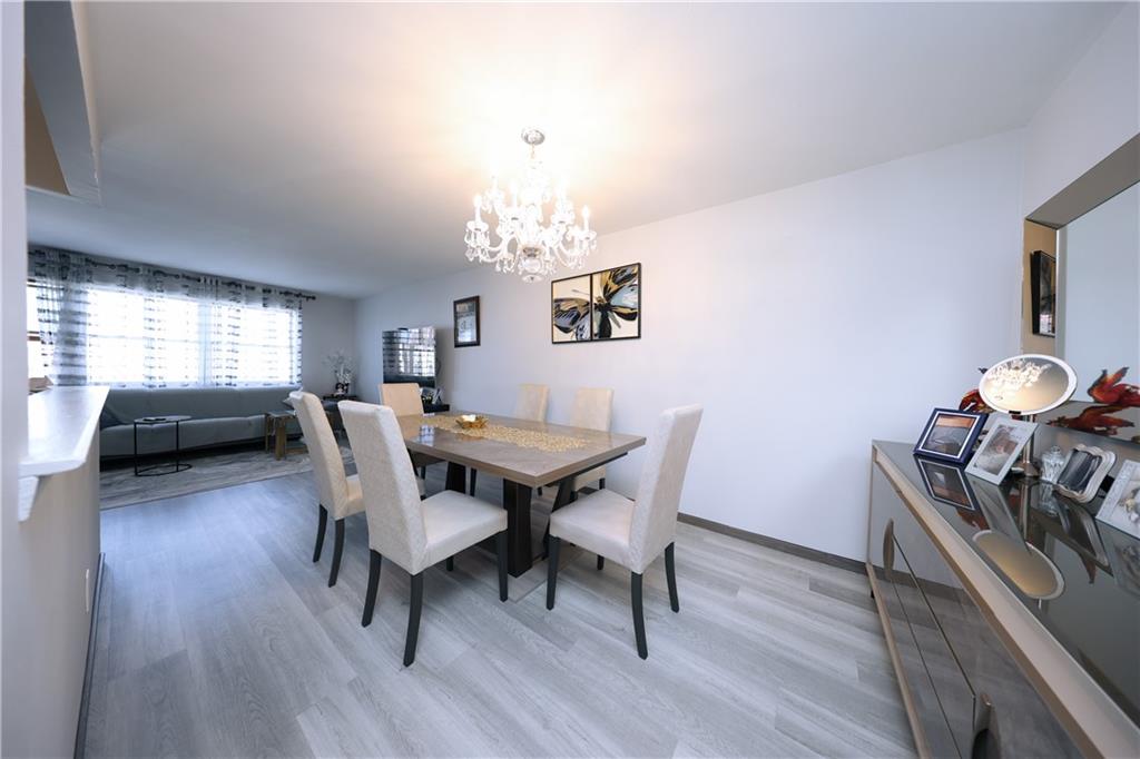 468 Ave Y Brooklyn, NY 11223 - Photo 38 of 47 a view of a dining room with furniture and wooden floor