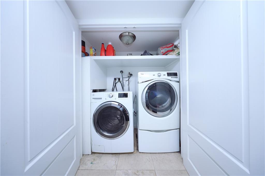 468 Ave Y Brooklyn, NY 11223 - Photo 47 of 47 a utility room with dryer and washer
