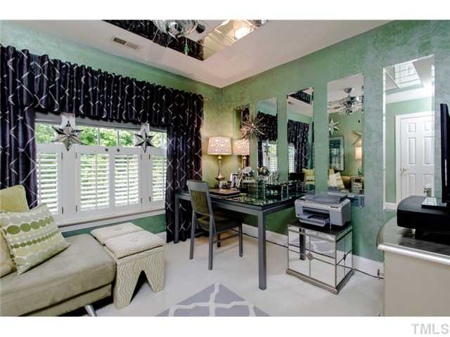 105 Carpathian Way Raleigh, NC 27615 - Photo 20 of 25 a living room with furniture and a large window